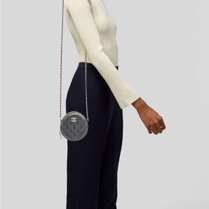 Iridescent CHANEL Black Quilted Mini Bag